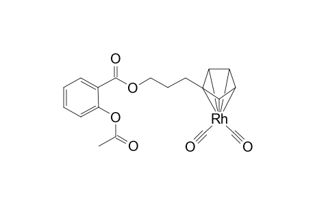 .pi.5-[3-((cyclopentadienyl)propyl)-2-acetoxybenzoate]dicarbonylrhodium