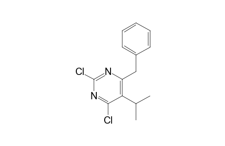 2,4-bis(chloranyl)-6-(phenylmethyl)-5-propan-2-yl-pyrimidine