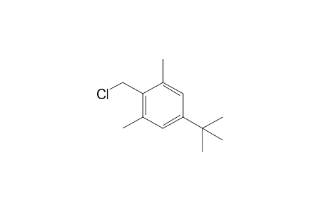 5-tert-Butyl-2-(chloromethyl)-1,3-dimethylbenzene