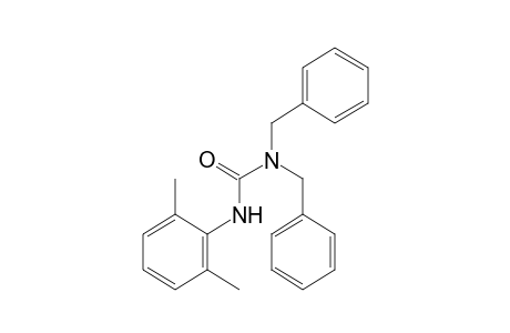 1,1-dibenzyl-3-(2,6-xylyl)urea