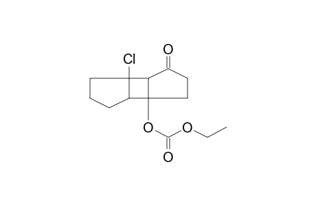 Tricyclo[5.3.0.0(2,6)]decan-3-one, 1-chloro-6-(ethoxycarbonyloxy)-