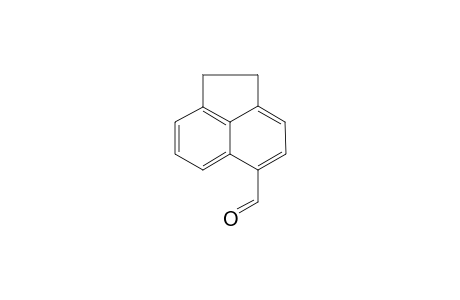 1,2-Dihydroacenaphthylene-5-carbaldehyde